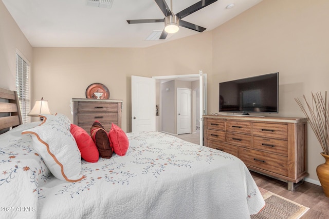 bedroom featuring hardwood / wood-style floors and ceiling fan