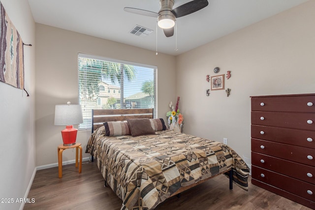 bedroom featuring ceiling fan and hardwood / wood-style floors