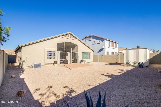 back of property with a patio area