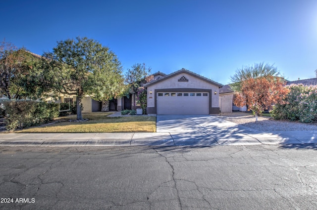 view of front of property featuring a garage