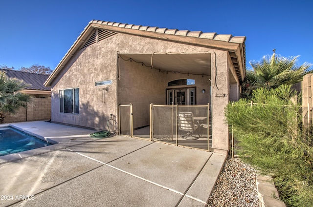 back of house featuring a patio area