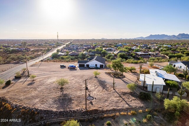 birds eye view of property featuring a mountain view