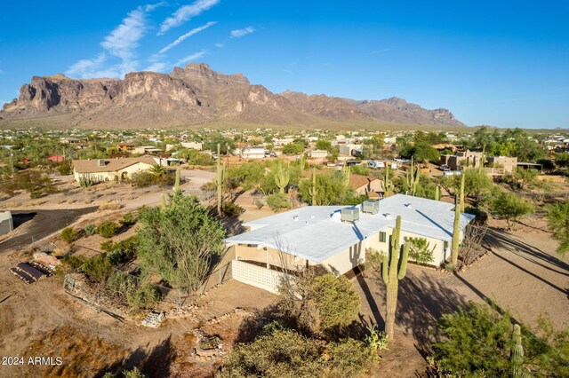 birds eye view of property featuring a mountain view