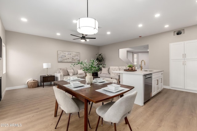 dining space with recessed lighting, baseboards, light wood-type flooring, and a ceiling fan