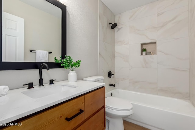 full bath featuring vanity, toilet, and shower / tub combination