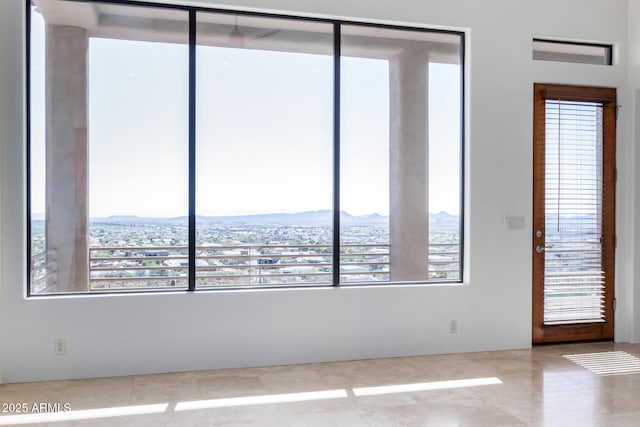 empty room featuring a mountain view