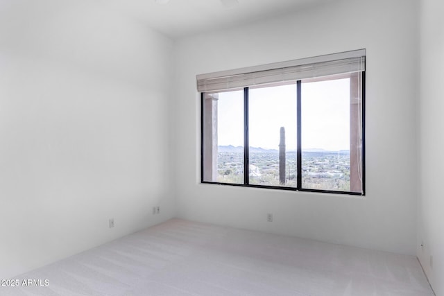 empty room featuring carpet flooring