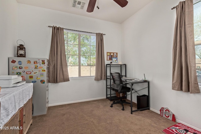 bedroom with carpet floors, visible vents, ceiling fan, and baseboards