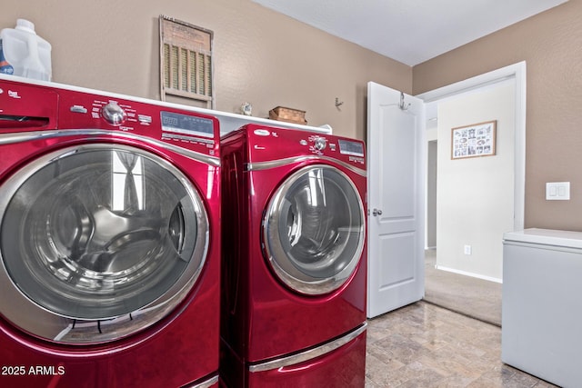 laundry area with laundry area and washing machine and dryer