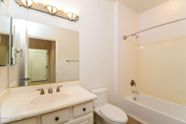 full bathroom featuring shower / bathing tub combination, vanity, and toilet