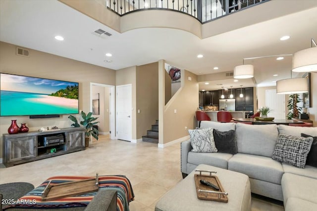 living room with light tile patterned floors