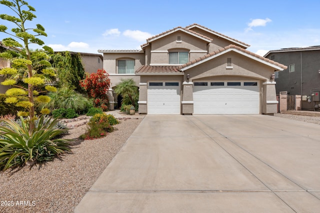 824 E Chelsea Dr, San Tan Valley, AZ 85140 - mediterranean / spanish-style house featuring a tile roof, concrete driveway, and stucco siding