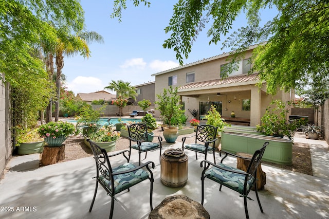 824 E Chelsea Dr, San Tan Valley, AZ 85140 - view of patio with a fenced in pool, a fenced backyard, an outdoor fire pit, and a ceiling fan