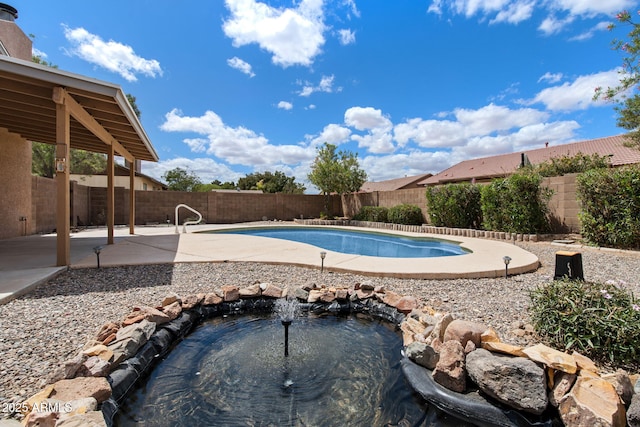 450 E Duke Dr, Casa Grande, AZ 85122 - view of swimming pool featuring a fenced in pool, a patio, and a fenced backyard