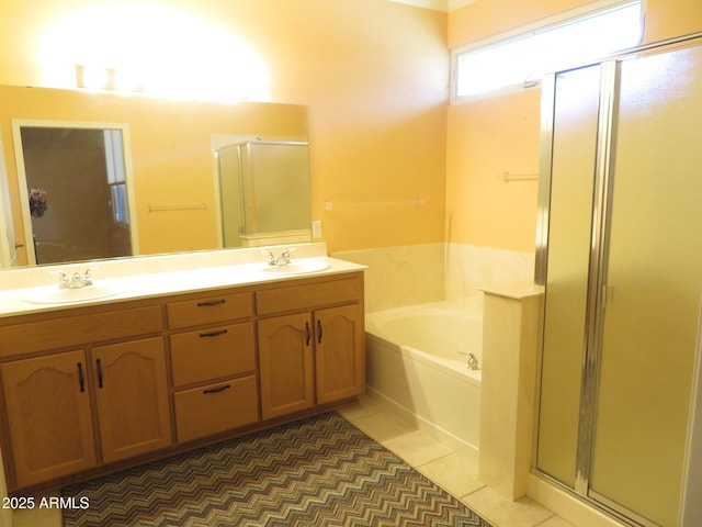 bathroom featuring vanity, shower with separate bathtub, and tile patterned floors