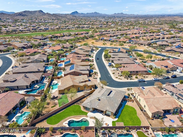 drone / aerial view featuring a mountain view and a residential view