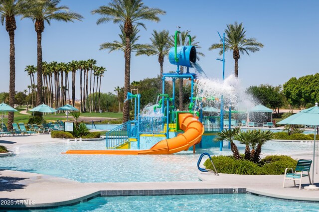 12493 S 179th Ln, Goodyear, AZ 85338 - community pool featuring a water play area and a water slide