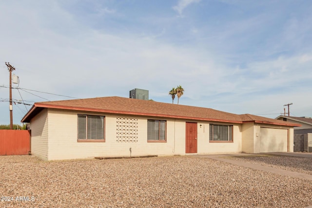 ranch-style home with a garage