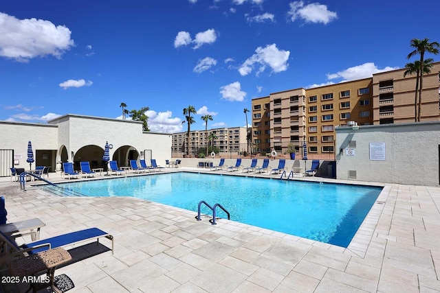 pool with a patio area