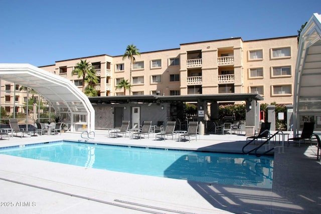 pool with a patio area