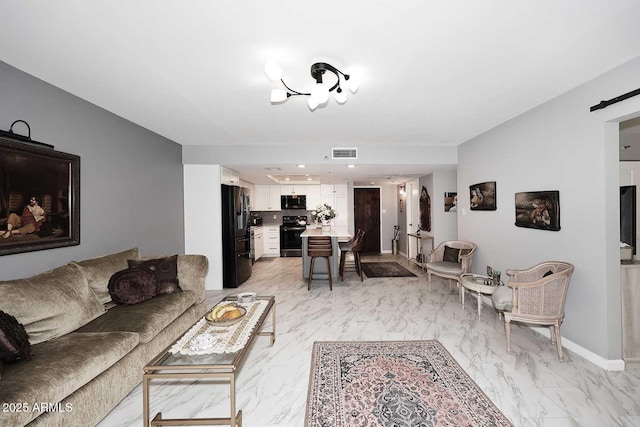 living area with visible vents, marble finish floor, and baseboards