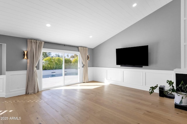 9136 N 81st St, Scottsdale, AZ 85258 - unfurnished living room with lofted ceiling and light hardwood / wood-style floors