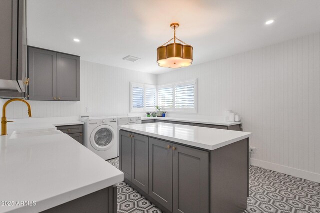 9136 N 81st St, Scottsdale, AZ 85258 - laundry room featuring sink, cabinets, and washing machine and clothes dryer