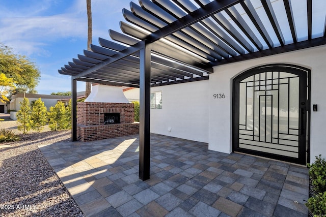 9136 N 81st St, Scottsdale, AZ 85258 - view of patio / terrace with an outdoor brick fireplace and a pergola