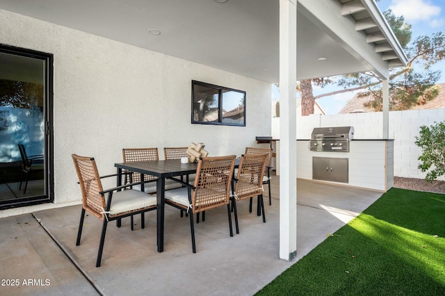 view of patio / terrace featuring an outdoor kitchen and area for grilling