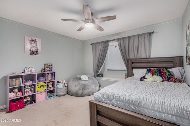 carpeted bedroom featuring a ceiling fan