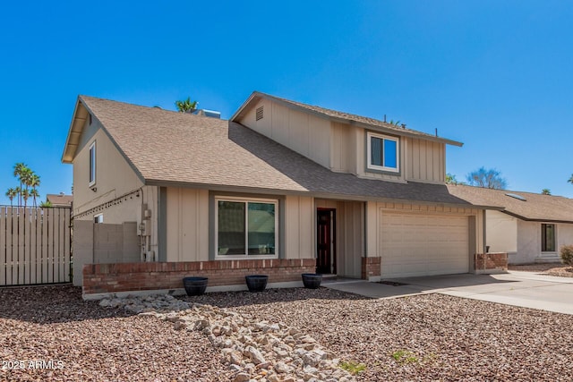 view of front of home with fence, concrete driveway, a shingled roof, a garage, and brick siding