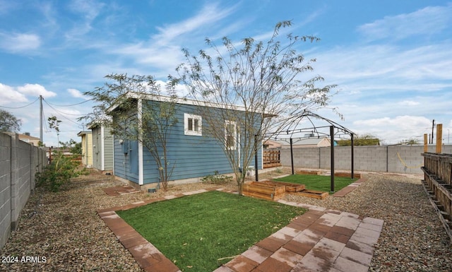 rear view of house with a yard