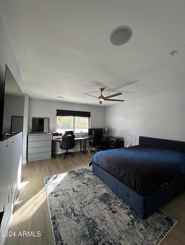 2311 E Colter St, Phoenix, AZ 85016 - bedroom featuring wood finished floors, a desk, and ceiling fan