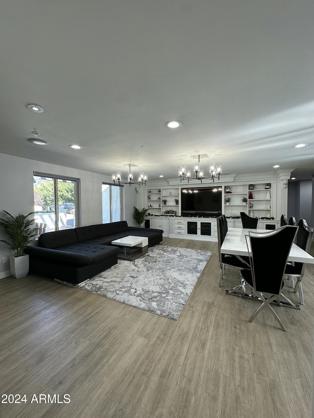 2311 E Colter St, Phoenix, AZ 85016 - living area featuring a chandelier, light wood finished floors, and recessed lighting