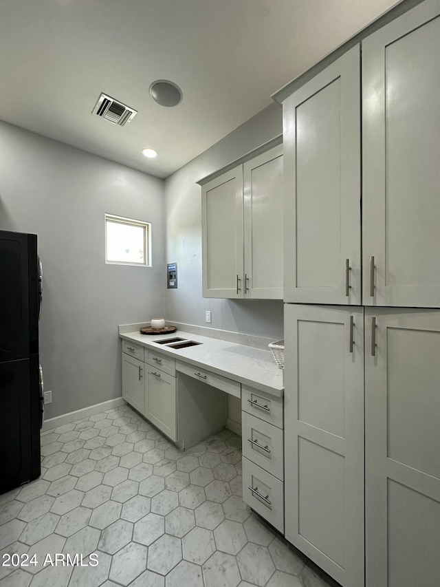 2311 E Colter St, Phoenix, AZ 85016 - kitchen with baseboards, recessed lighting, and light tile patterned floors