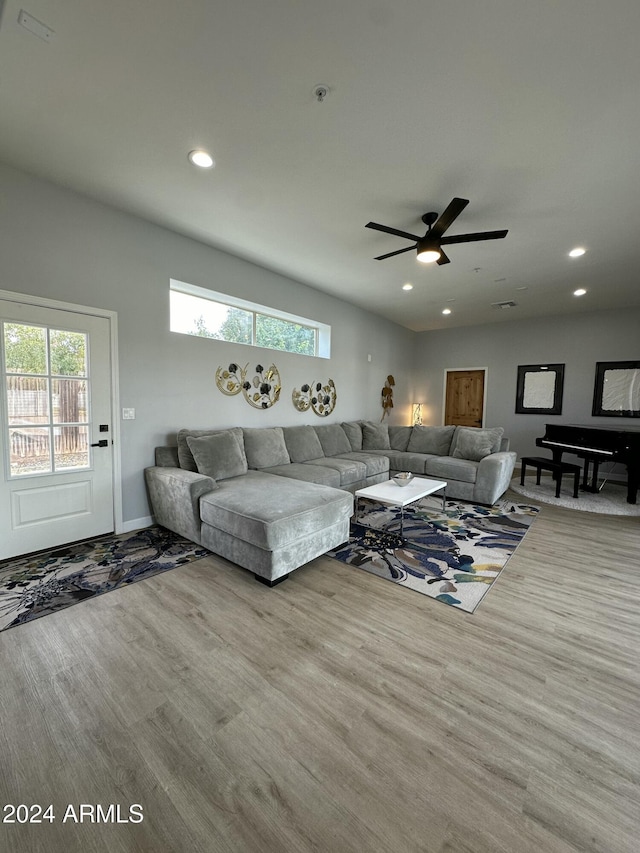 2311 E Colter St, Phoenix, AZ 85016 - living room with wood finished floors, plenty of natural light, recessed lighting, and a ceiling fan
