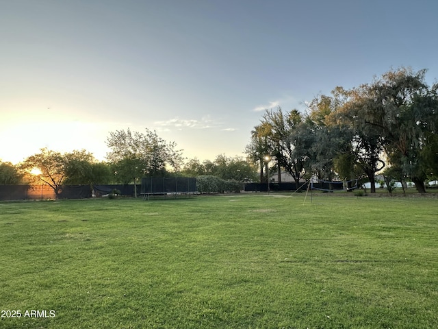 2311 E Colter St, Phoenix, AZ 85016 - yard at dusk featuring a trampoline