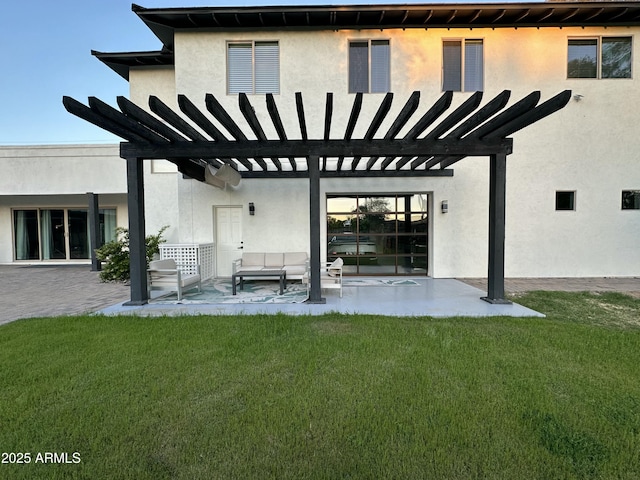 2311 E Colter St, Phoenix, AZ 85016 - rear view of property featuring a pergola, a yard, stucco siding, and a patio