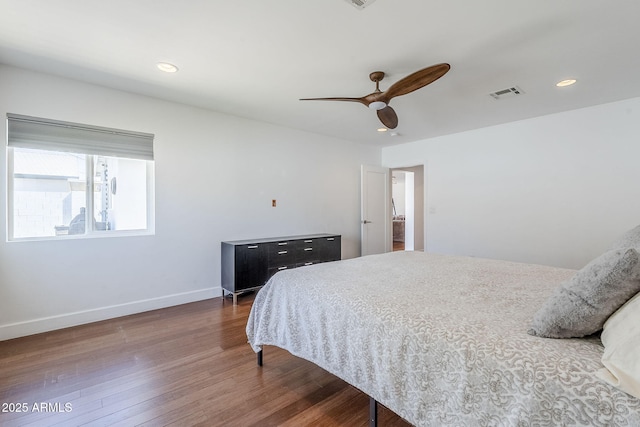 bedroom featuring a ceiling fan, visible vents, wood finished floors, baseboards, and recessed lighting