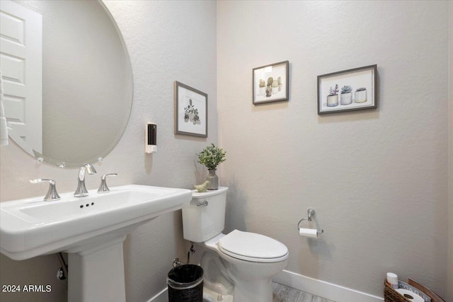 bathroom featuring toilet