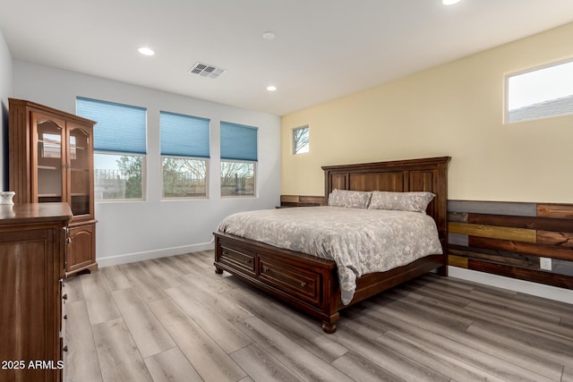 bedroom featuring light hardwood / wood-style floors