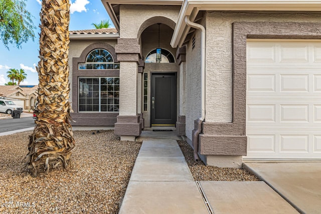 1655 W Stanford Ave, Gilbert, AZ 85233 - entrance to property featuring stucco siding, an attached garage, and a tile roof