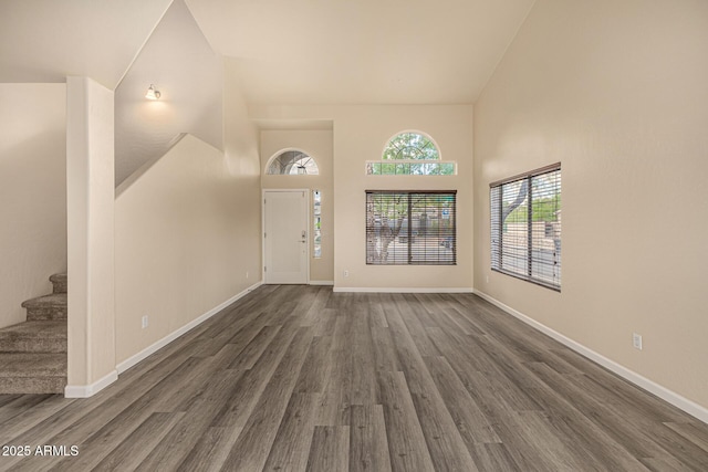 1655 W Stanford Ave, Gilbert, AZ 85233 - foyer with stairs, dark wood-type flooring, baseboards, and high vaulted ceiling