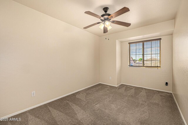 1655 W Stanford Ave, Gilbert, AZ 85233 - empty room featuring dark colored carpet, a ceiling fan, and baseboards