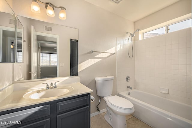 1655 W Stanford Ave, Gilbert, AZ 85233 - full bathroom with toilet, vanity, shower / bath combination, tile patterned floors, and baseboards