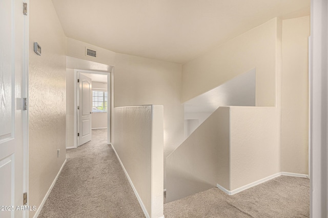 1655 W Stanford Ave, Gilbert, AZ 85233 - corridor featuring an upstairs landing, carpet flooring, and baseboards