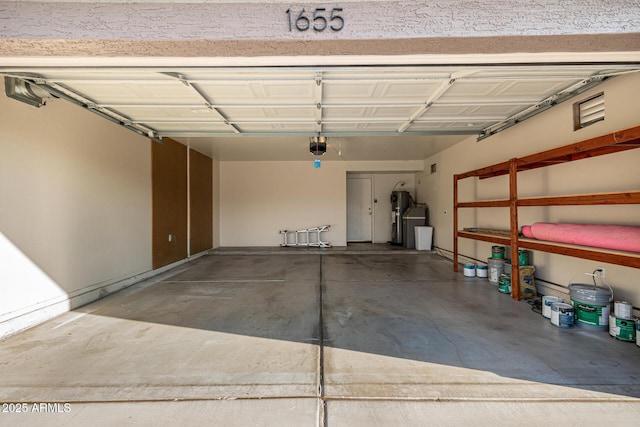 1655 W Stanford Ave, Gilbert, AZ 85233 - garage featuring water heater and a garage door opener
