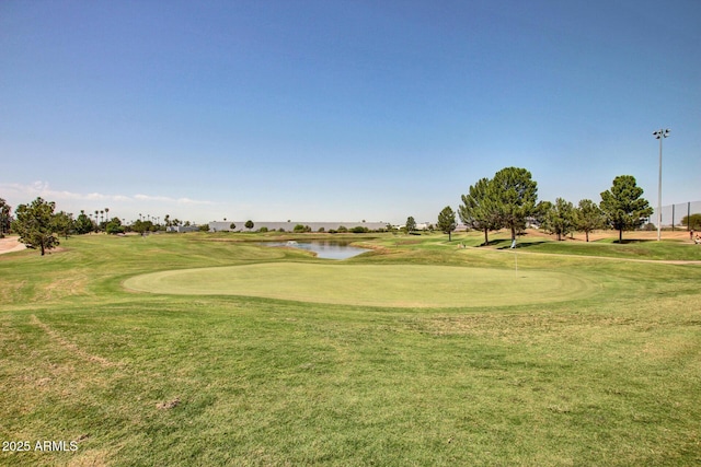 1655 W Stanford Ave, Gilbert, AZ 85233 - view of community with golf course view, a water view, a yard, and a putting area