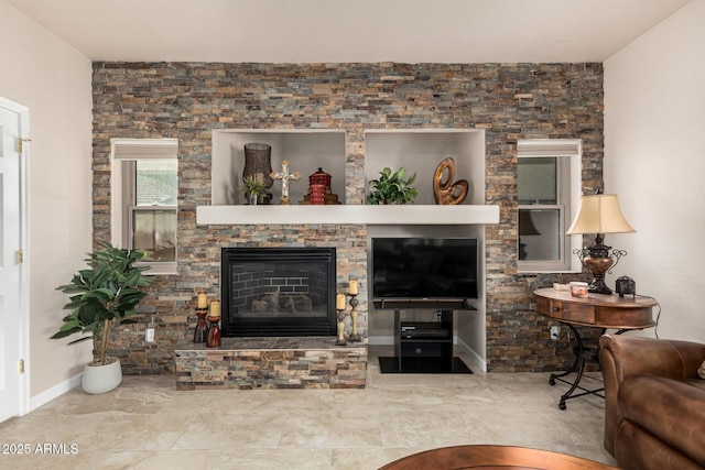 living area featuring a fireplace