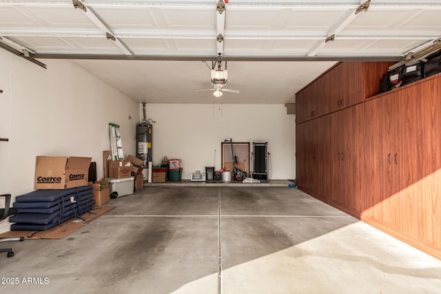 garage featuring gas water heater and a garage door opener